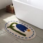tapis ovale chic elegance et praticite pour votre salle de bain 253d66 40x60cm 750 1